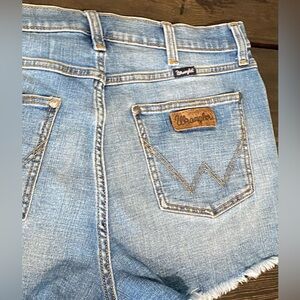 Vintage Wrangler denim shorts light wash distressed
